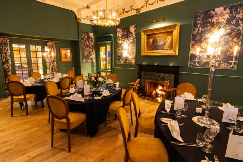 Dinner setting on oval tables for dining.