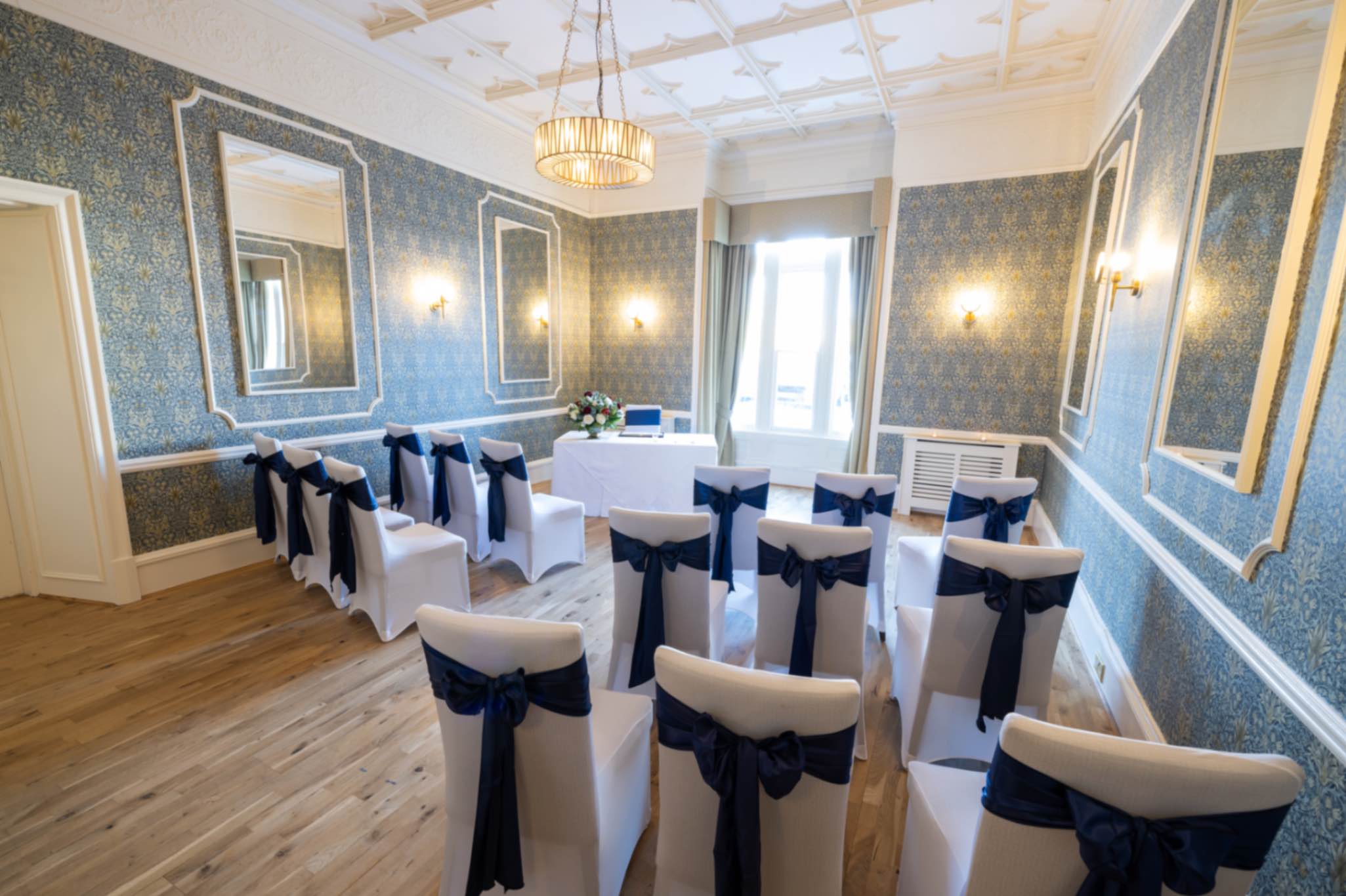 Macleod Room Ceremony Room at The Kingsmills Hotel with Chair Covers and Sashes from Evas Covers