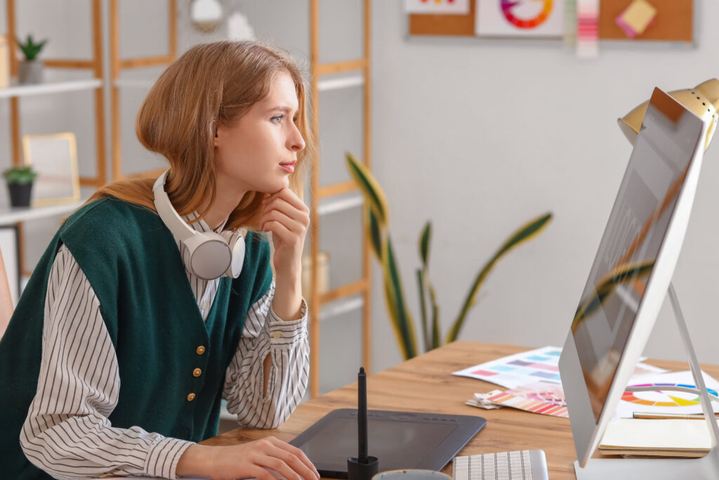 Woman working on a poster design